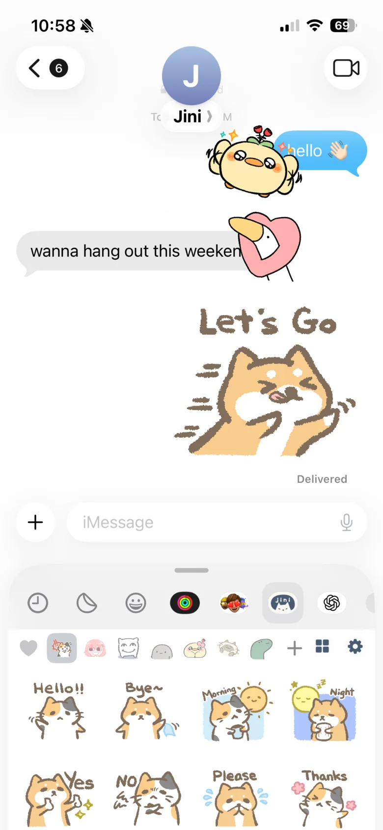 An iMessage conversation with stickers sent alongside the messages, and the sticker drawer open below
